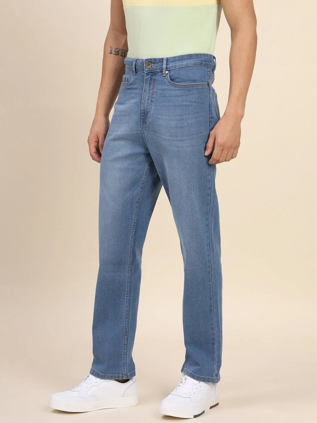 Men's Slim Fit Light Blue Denim Jeans Waistband With Belt Loops Has A Button Rivet And Zip Closure